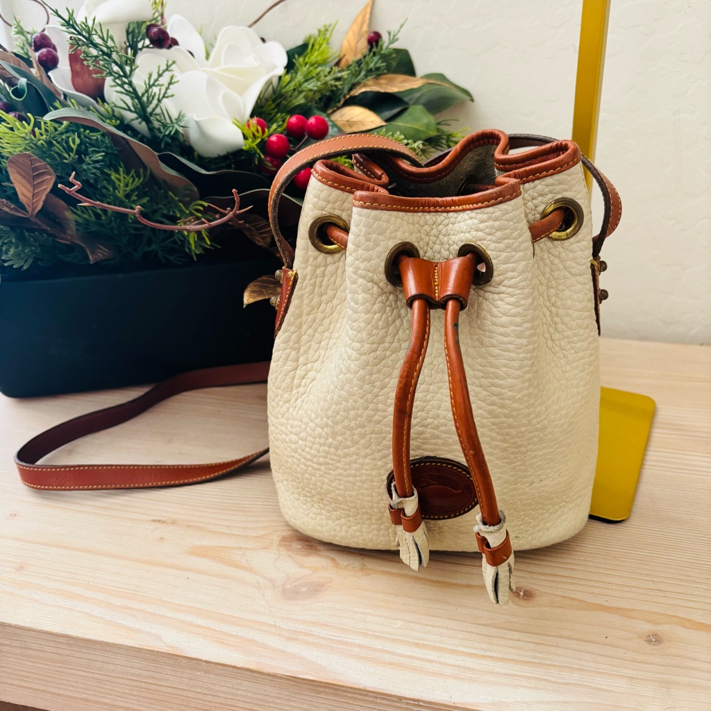 Dooney & Bourke Women's Vintage Tan Bone Mini Drawstring Bucket Crossbody Bag